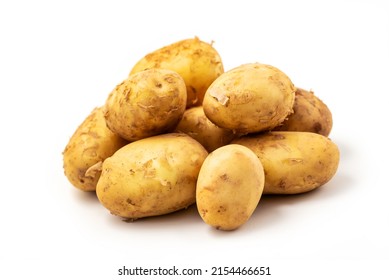 Heap of young potato isolated on white background with clipping path included. Organic potato right from the garden
