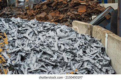 Heaps of ferrous and non-ferrous scrap metal at scrap works - Shutterstock ID 2150450197
