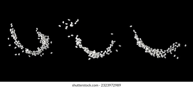 Heaps of uncooked Japanese short grain rice piled together isolated on black background. - Powered by Shutterstock