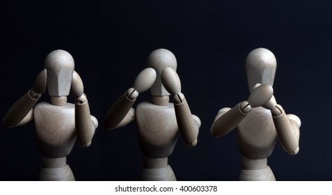 Hear, see and be silent shown by a wooden mannequin - Powered by Shutterstock