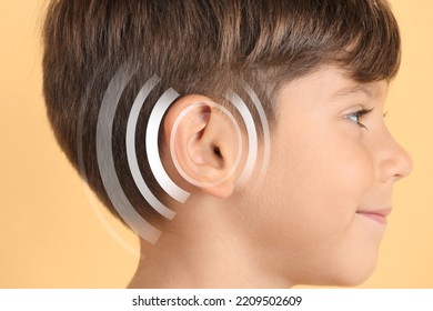 Hearing Loss Concept. Little Boy And Sound Waves Illustration On Yellow Background, Closeup