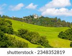 Hearst Castle on top of the mountain. Hearst Castle is a National Historic Landmark and California Historical Landmark. Panoramic bottom up view of Hearst Castle. Landmarks of California in America