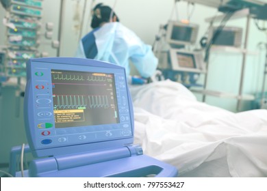 Heart Activity Tracing Monitor In The Patient Ward With Working Nurse.