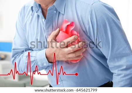 Heart attack concept. Senior man suffering from chest pain, closeup