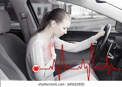 Heart Attack Concept. Woman Suffering From Chest Pain In Car