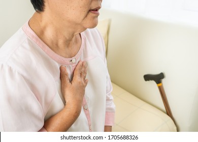 Heart Attack Old Woman Holding Chest In Bed Room, Healthcare Problem Of Senior Concept