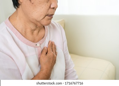 Heart Attack Old Woman Holding Chest In Bed Room, Healthcare Problem Of Senior Concept