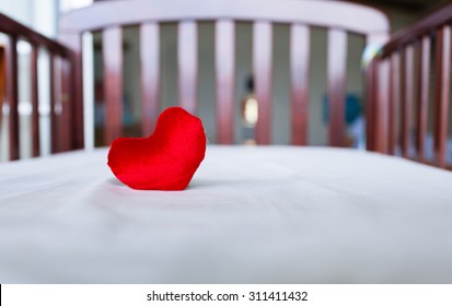 Heart In Baby's Crib
