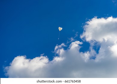 Heart Balloon Flying Into The Sky