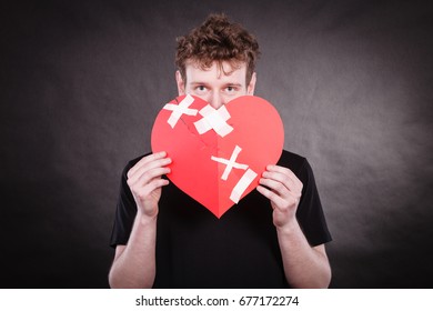 Similar Images Stock Photos Vectors Of Bad Relationships Breaking Up Sadness Emotions Concept Very Sad Young Man Holding Broken Heart Made Of Paper 1015656259 Shutterstock