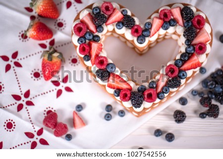 Similar – Strawberry tartlet in heart shape