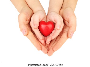 Heart In Child And Mother Hands Isolated On White