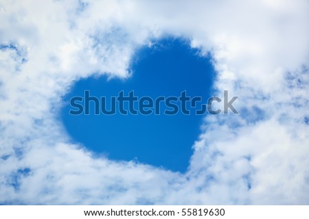 Heart from cloud in the blue sky. Valentine's Day. Symbol of love