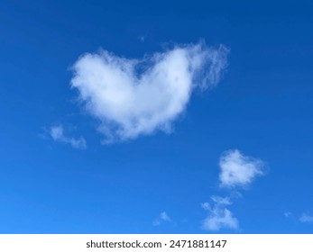 heart clouds floating in the sky - Powered by Shutterstock