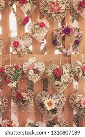 heart decorations made with ropes, vertical image of ornamental symbols of love