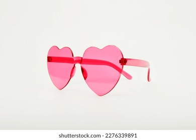 heart glasses sideways on light background