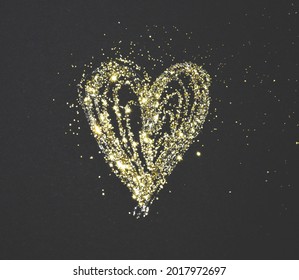 Corazón con brillo dorado