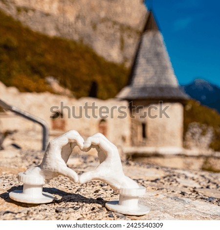 Heart hands gesture with a 3D printed sculpture - free model from thingiverse - at Ehrenberg castle ruins near Reutte, Tyrol, Austria