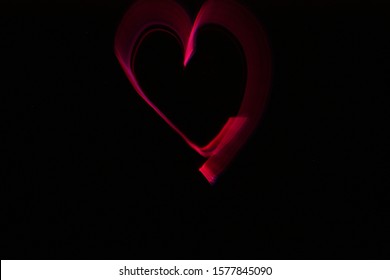 Heart Light Painting In A Dark Room 