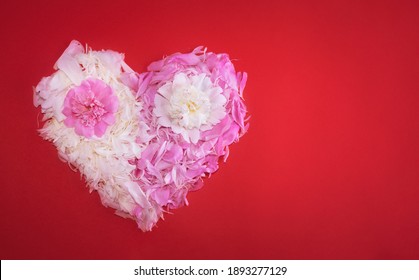 The heart is lined with flower petals. Heart made of flowers. Valentine's Day. Color palette. Fashion love - Shutterstock ID 1893277129