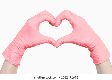 Heart Made Of Pink Medical Gloves Isolated On White Background