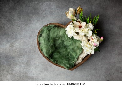 heart made of wood, decorated with roses. basket for a newborn photo shoot. white rose. heart