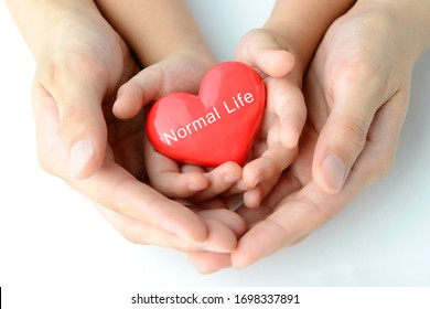 Heart Object With Normal Life Words And Child And Parent Hands