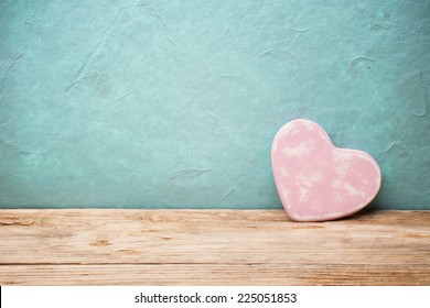 Heart On A Wooden Table. Valentines Day Greeting Card.