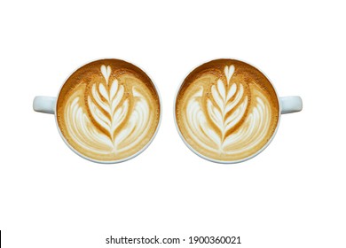a heart pattern late-art coffee in a white clean cup on white background,Two white cups of tasty cappucino and valentine letter with heart. Top view