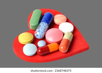 Heart and Pills on grey Transparent background - Shutterstock ID 2368748375