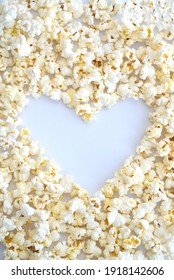 
Heart from popcorn on white background