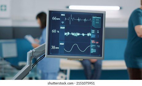 Heart rate monitor at checkup visit to measure heartbeat and pulse pressure, connected to patient exercising for physical recovery. Mechanical instrument to examine health care. Close up. - Shutterstock ID 2151075951