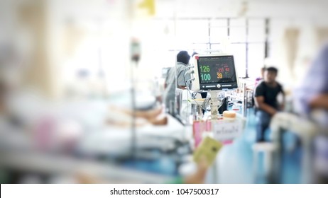 Heart Rate Monitor, Electrocardiogram (ECG) In Hospital With Patient With Drip In Hospital Background