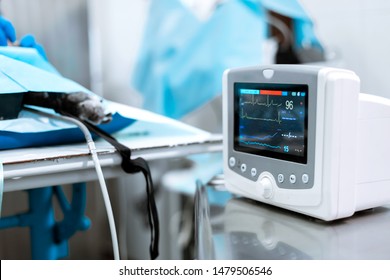 Heart rate monitor in hospital theater. Medical vital signs monitor instrument in a hospital on anesthesia surgery monitor.  ECG Patient Monitor. medical electronics.