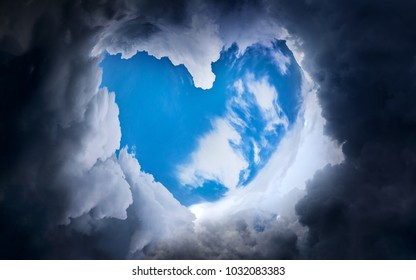 Heart Shape with Blue Sky in the Dramatic and Storm Clouds
