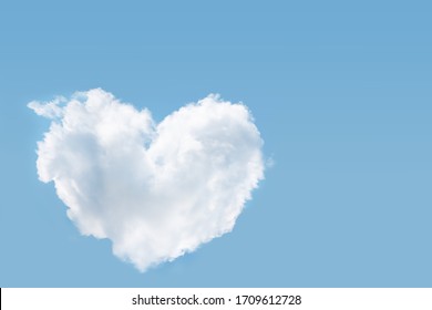 Heart Shape Cloud In Blue Sky