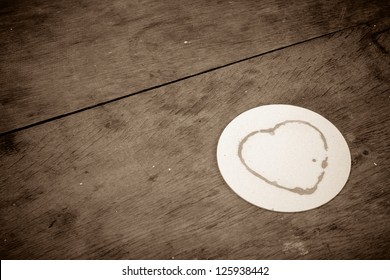 Heart Shape Coffee Stain On Wooden Table Valentine Background