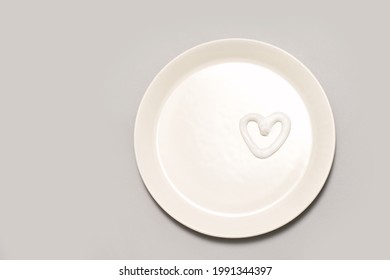 Heart Shape Cream. Beauty Lotion. Mayonnaise Smear On White Plate. Top View With Copyspace. White Product Smear. Valentine Concept