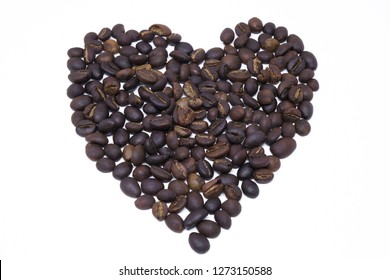 Heart Shape Draw By Coffee Beans. Royalty High-quality Free Stock Macro Photo Image Shape Heart Love Design Text By Roasted Black Coffee Bean On White Background. Close-up Or Macro Photo Coffee Beans