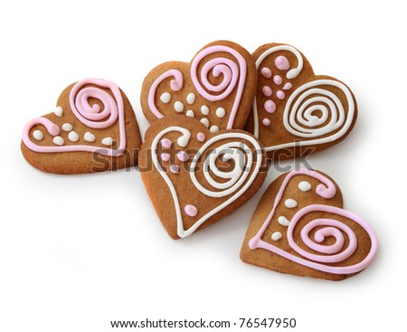Heart shape ginger breads decorated with pink and white glazing