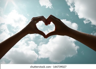 Heart Shape With Hand In Sky