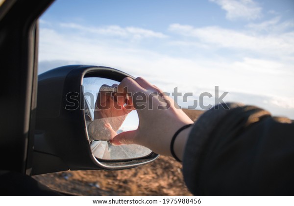 heart shape on the side\
mirror in a car