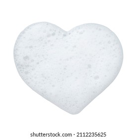 heart shape of white facial skin care foam creamy bubble soap sponge on white background. love or valentines day concept