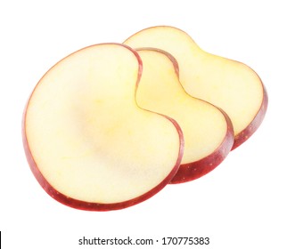 Heart Shaped Apple Slices On A White Background