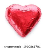 Heart shaped chocolate candy in red foil isolated on white, top view