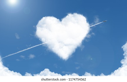 heart shaped cloud and airplane in the sky