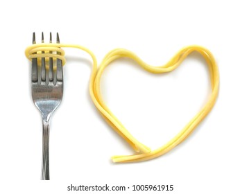 Heart Shaped Cooked Capellini Spaghetti With Fork Isolated On White Background