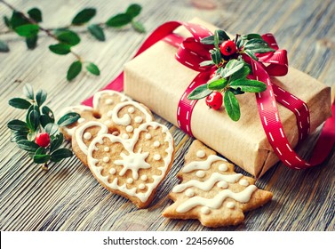 Heart shaped cookies with icing decoration and a present box - Powered by Shutterstock