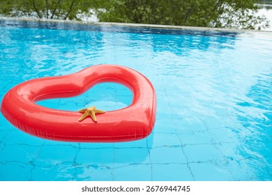 heart shaped float in the pool