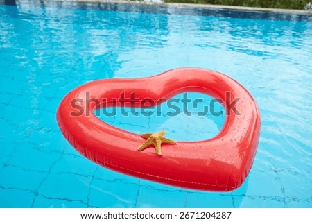 heart shaped float in the pool